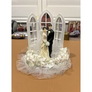 Wilton "Dedication" Wedding Cake Top, Black coat, black pants.